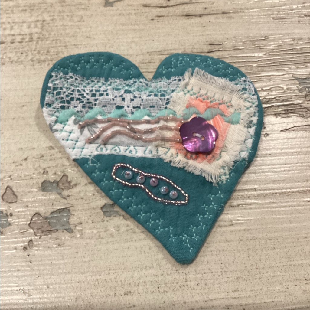 Boutique: Handcrafted Teal And Purple Heart Brooch